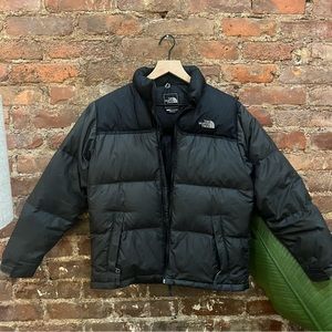 Grey and black North Face puffer coat